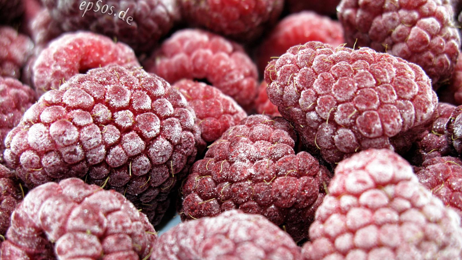 Close-up of frosted, frozen raspberries